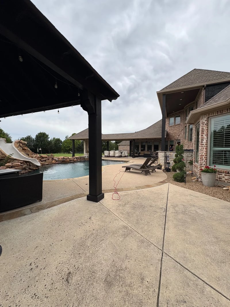 Professional exterior window cleaning at a resort-style pool estate in North Texas